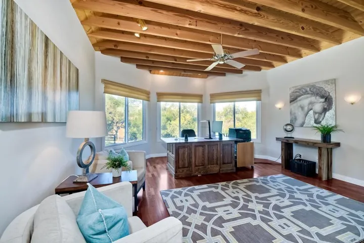 The bedroom is being used as an office. It has a spacious walk-in closet.