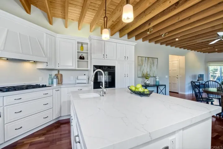 You'll enjoy the bar sink added to the spacious island!