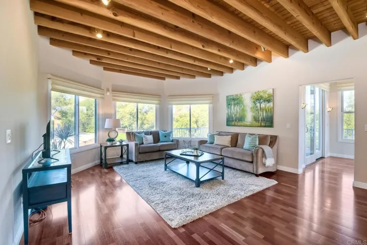 Notice the gorgeous Brazilian Cherry flooring & lovely views.