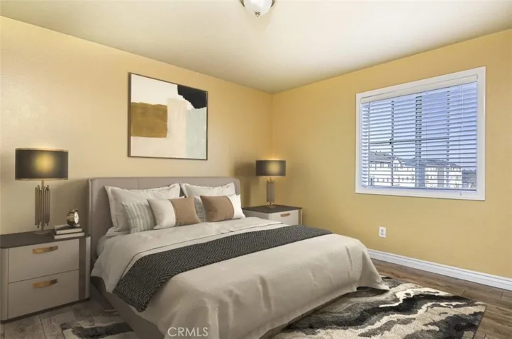 Virtually staged large main bedroom