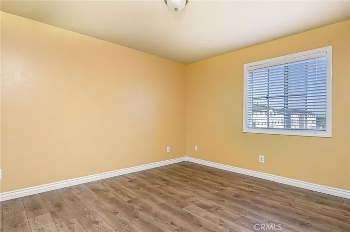Main bedroom without the staging