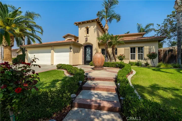 Landscaped front yard offers nice curb appeal.