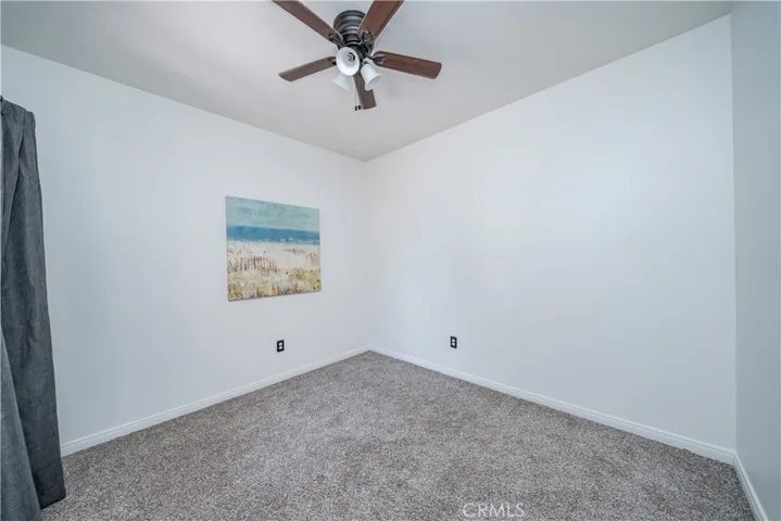 Bedroom 3 with ceiling fan