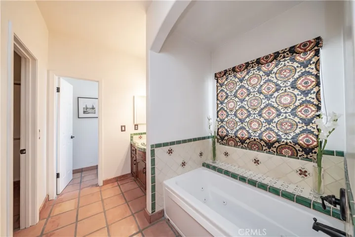 Jetted tub in master bathroom.