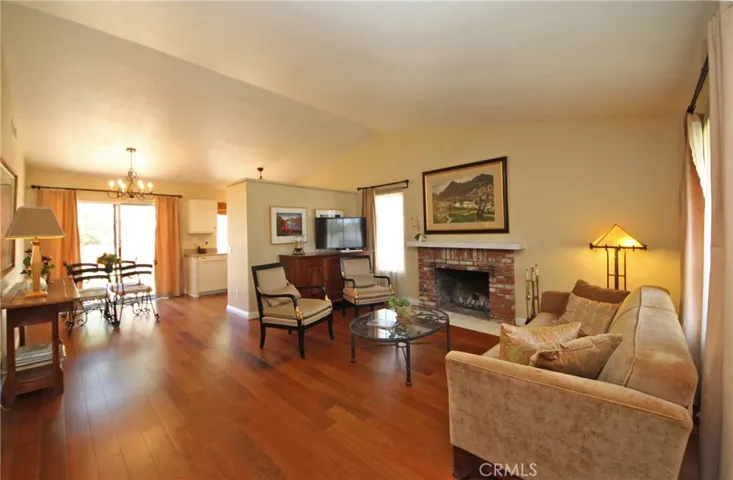 Open to the dining area and kitchen