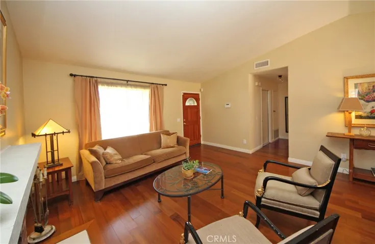 Spacious living room under a vaulted ceiling