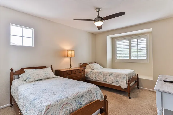 Bedroom #3 is spacious enough to comfortably fit 2 twin size beds and features bench seating at the window.