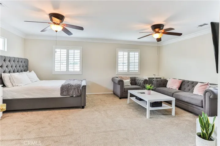 Bonus room is huge and could be what ever you dream up. Here it's a private living space complete with bed & living space