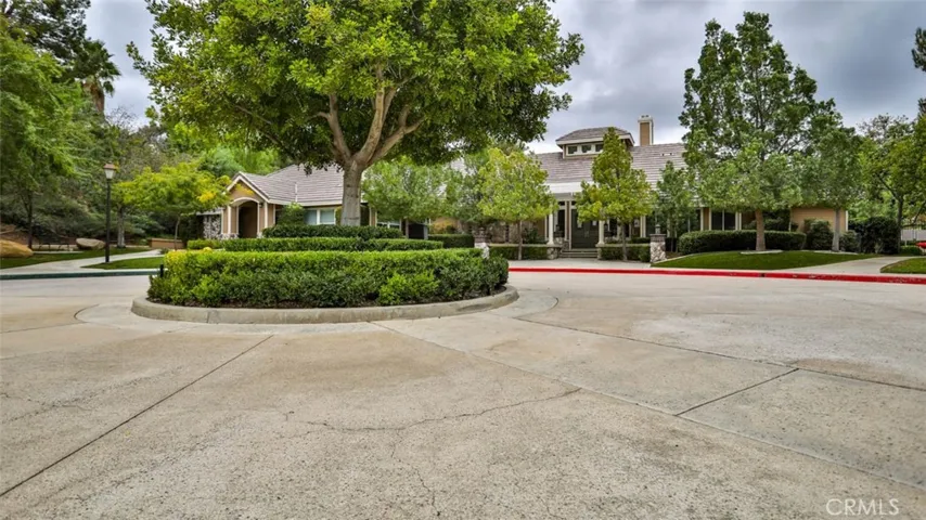 Clubhouse where the largest of 2 pools and spas, & gym is located