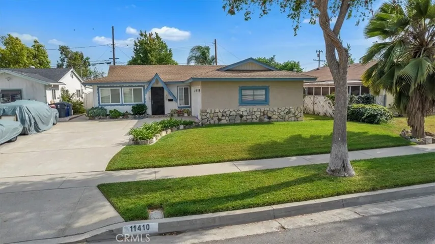 Large 5,458 square foot Lot * Beautifully Landscaped * Interior Lot with Large Expanded Driveway