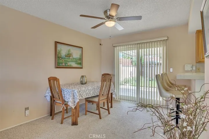 Dining Area off of Kitchen with Upgraded Dual-Pane Vinyl Frame Sliding Glass Door