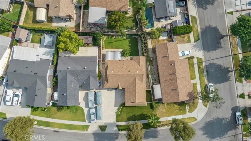Large 5,458 square foot Lot * Beautifully Landscaped * Interior Lot with Large Expanded Driveway *  Close to Schools, Public Parks, The Dog Park, and the San Gabriel River Bike Trail that goes all the way to the Beach!  Easy Access to the 605, 91, and 405 freeways, and the Long Beach Airport.