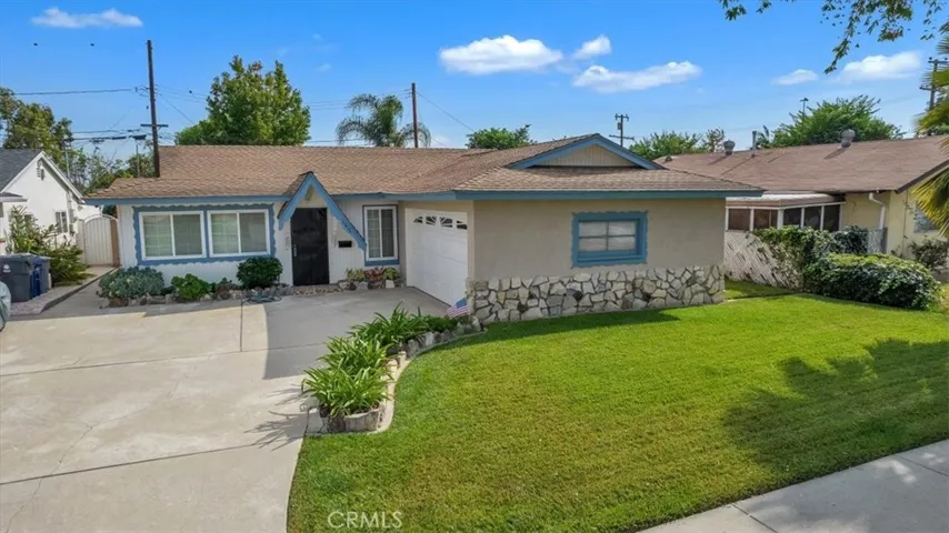 Single Story Home:  1,205 square feet of Living Space * Interior Lot with Large Expanded Driveway