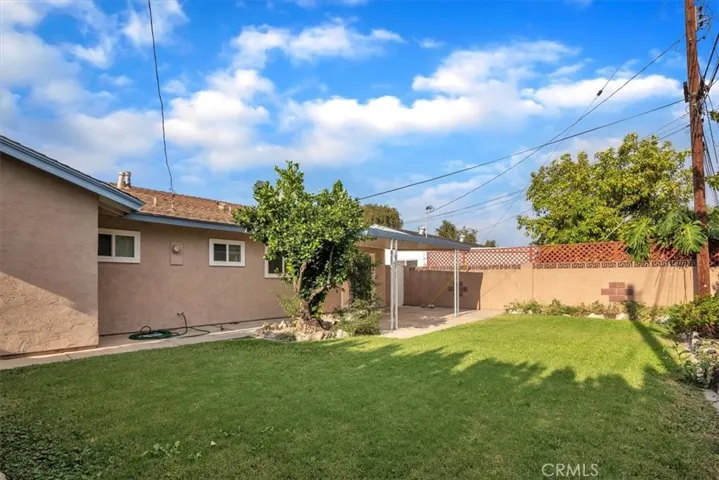 Large 5,458 square foot Lot * Beautifully Landscaped * Spacious Backyard Surrounded with Block-wall Fencing * Backyard includes a Covered Patio Ideal for Barbeques and Entertaining Family and Friends