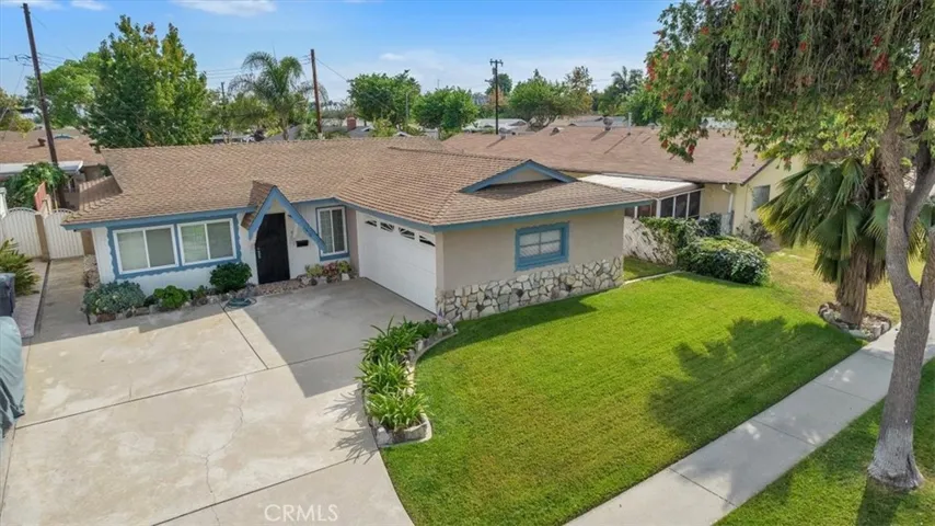 Attractive Location:  Interior Lot with Large Expanded Driveway * Just a Short Walk to ABC District Schools * This Beautifully Maintained Home is only minutes from Lakewood Mall, Cerritos Mall, and Restaurants
