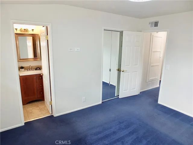 Master bedroom with bathroom