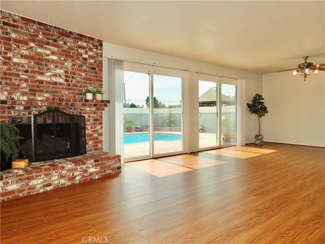 Beautiful fireplace beside double sliders
