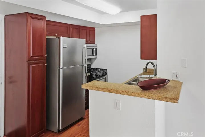 Kitchen opens to dining area