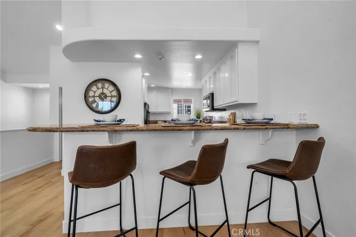 Breakfast bar at granite counter top