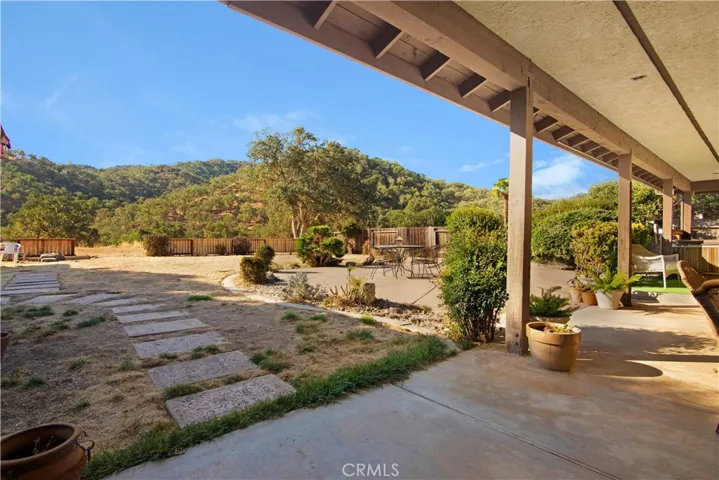 Yard backs up to an easement, enjoy the beauty of the country side and all the trees.