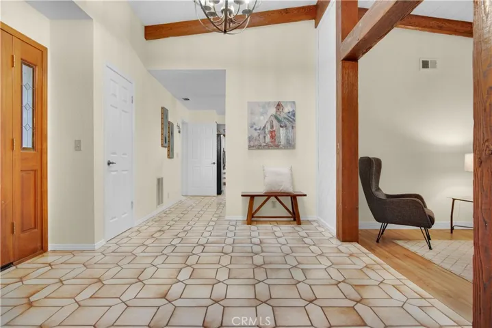 Spacious entry way with tiled floors