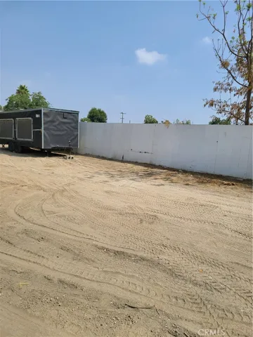 FROM LOT LOOKING SOUTH EAST, TRAILER IS NOT PART OF SALE