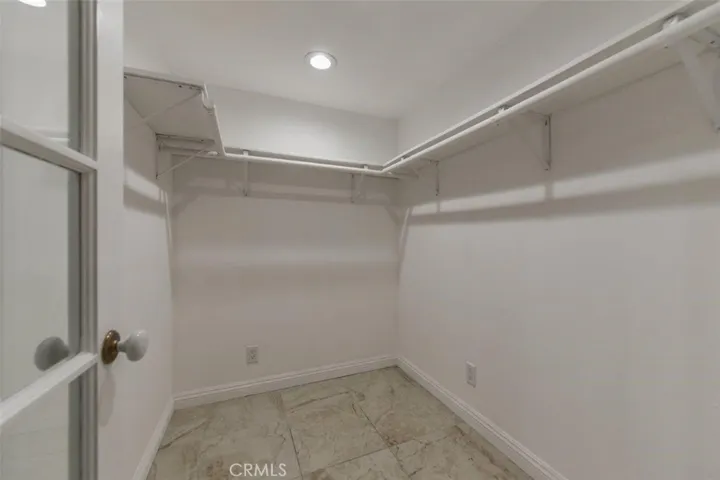 walking closet in master bedroom