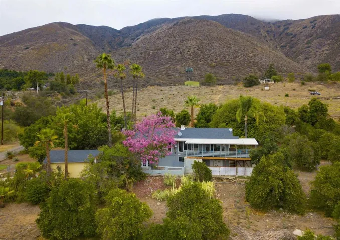 BEAUTIFUL HIGH VIEW OF THE HOME AND GARAGE