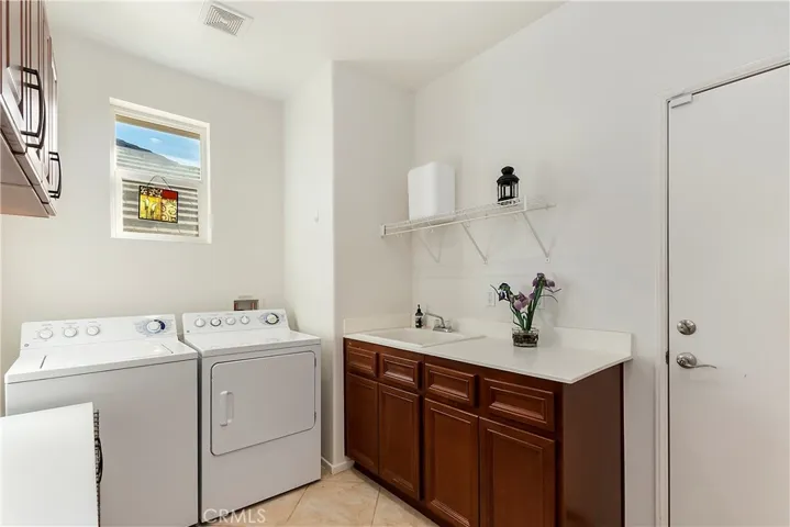 LAUNDRY ROOM - WASHER & DRYER ARE INCLUDED IN PRICE - GREAT UTILITY SINK - DOOR TO GARAGE