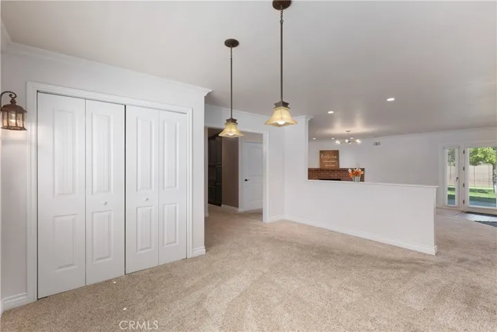 Living room with coat closet