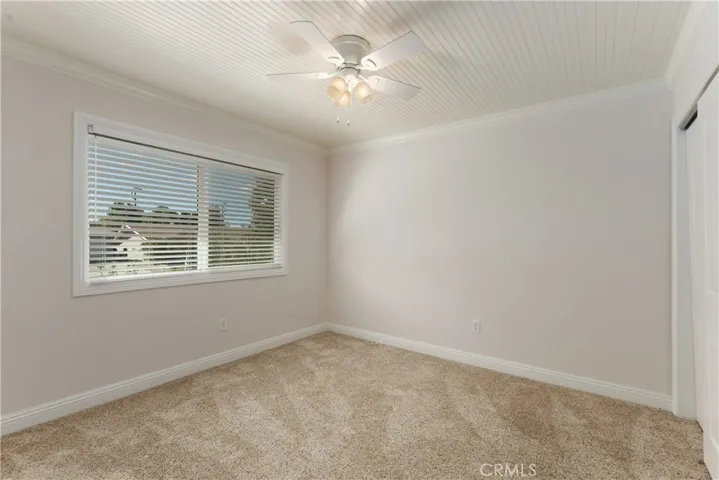 Additional bedroom with ceiling fan