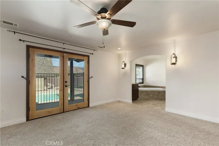 Double doors for convenient access to backyard and pool