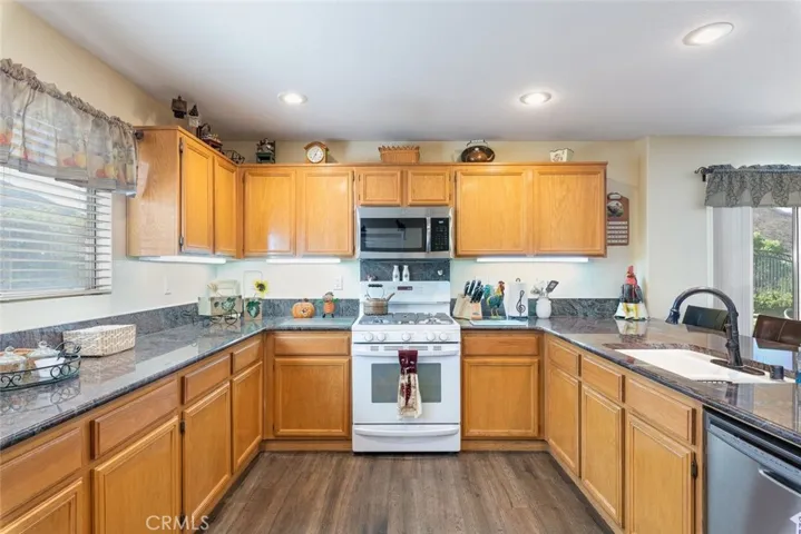 Large kitchen area with plenty of storage.