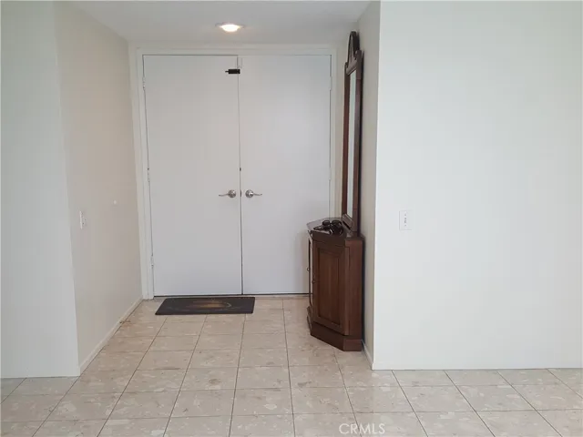 Front entry foyer with tiled floor.