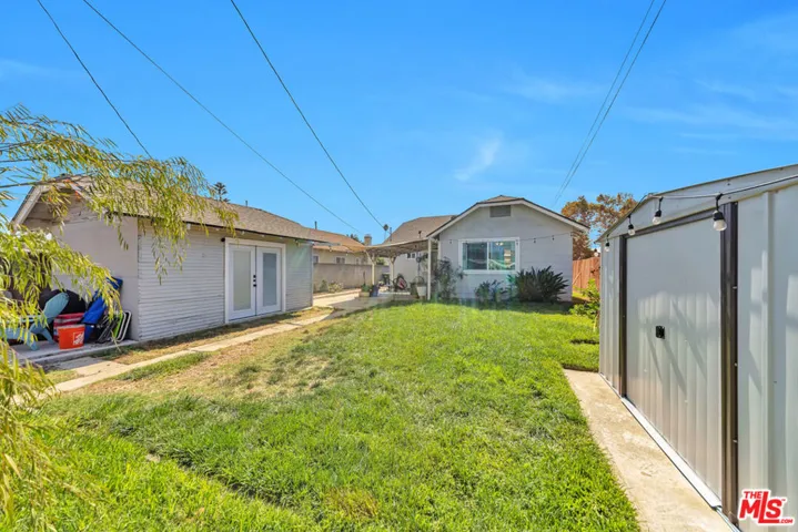 Backyard with shed & 2 patios
