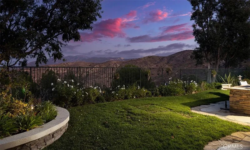 Another breathtaking view to enjoy relaxed living.  Ample room for play or an addition of a pool!