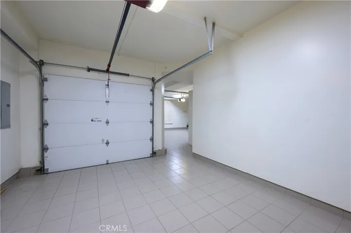 Oversized 3-car Tiled Garage. 1 Single, 2 Double