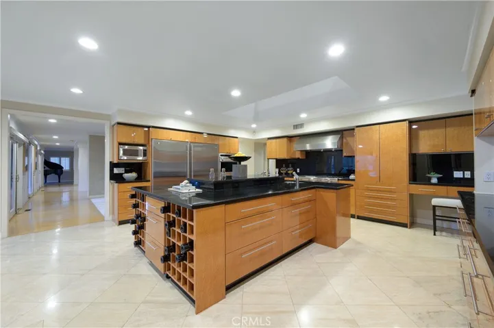 Tremendous Chef's Kitchen. 2 36" Sub Zeros, Wolf Double Ovens, 6-Burner Gas Cooktop,  Microwave & Appliance Garage