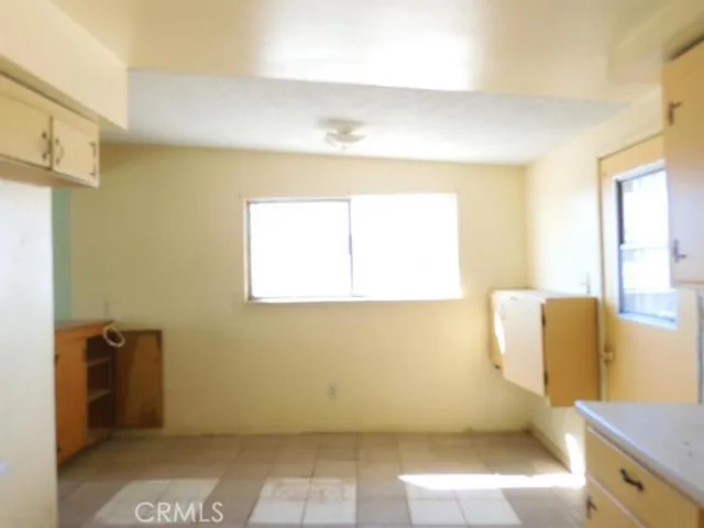 Dining area off kitchen.  Door to the right goes to the back yard