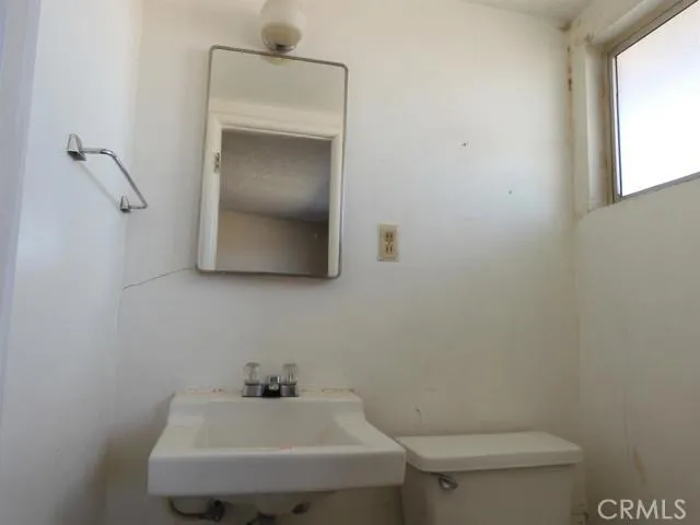 Main bedroom has a half bath
