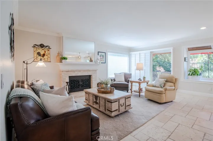 Adjacent to the kitchen is the family room with access to the backyard.