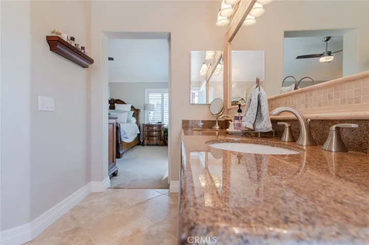 Master bathroom with quartz countertops.