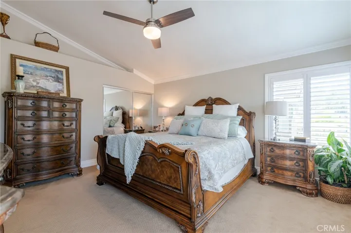 Master bedroom with vaulted ceiling