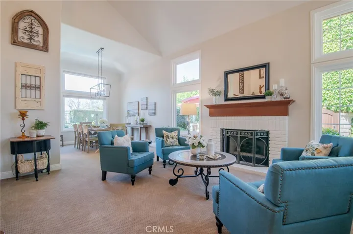 Stunning living room with  fireplace and vaulted ceilings