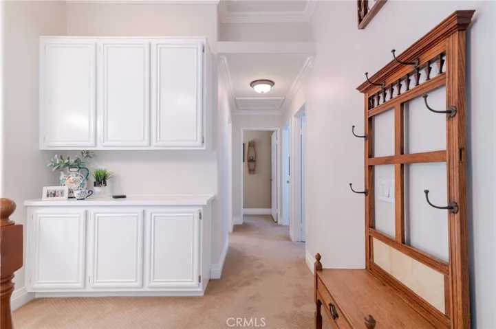 Upstairs hallway with white cabinets