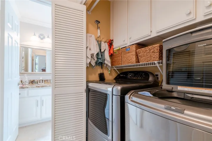 Laundry room located downstairs.