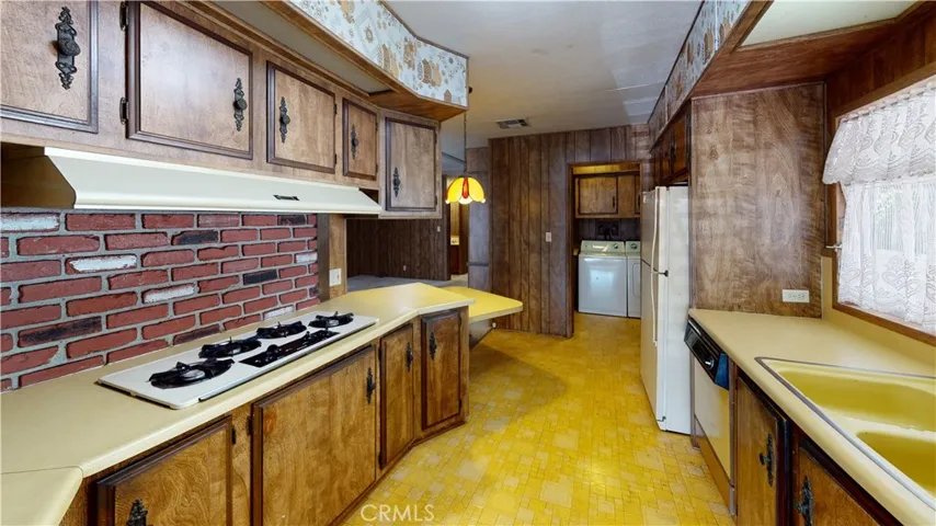 Kitchen view to laundry room