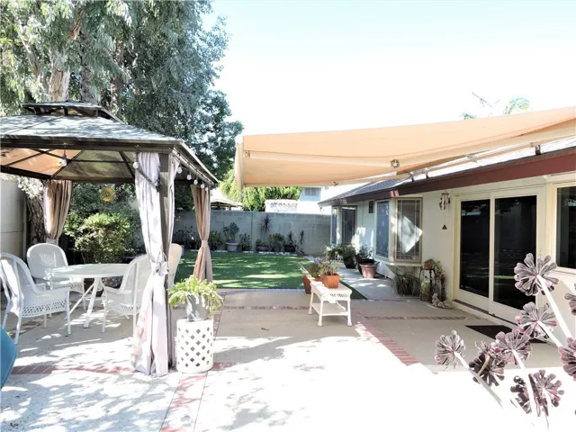 Gazebo and retractable awning