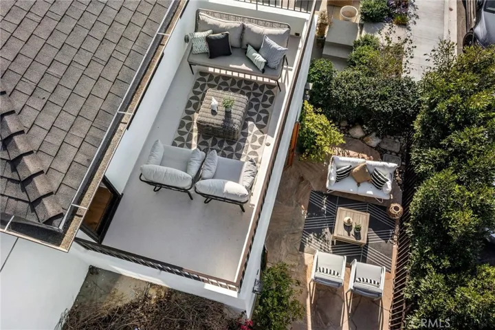 Aerial view of front patio and balcony.