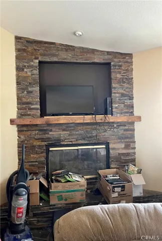 Stack stone fireplace &  built in TV/entertainment system